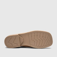 Underside view of a Hush Puppies Soft Style Ladies Comfort Sandal Kathan in caramel, showcasing the durable textured sole