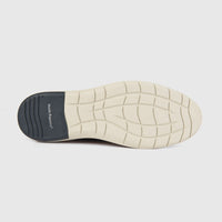 Hush Puppies Dylan men's casual lace up shoe, bottom view showing light beige tread sole with black heel pad.