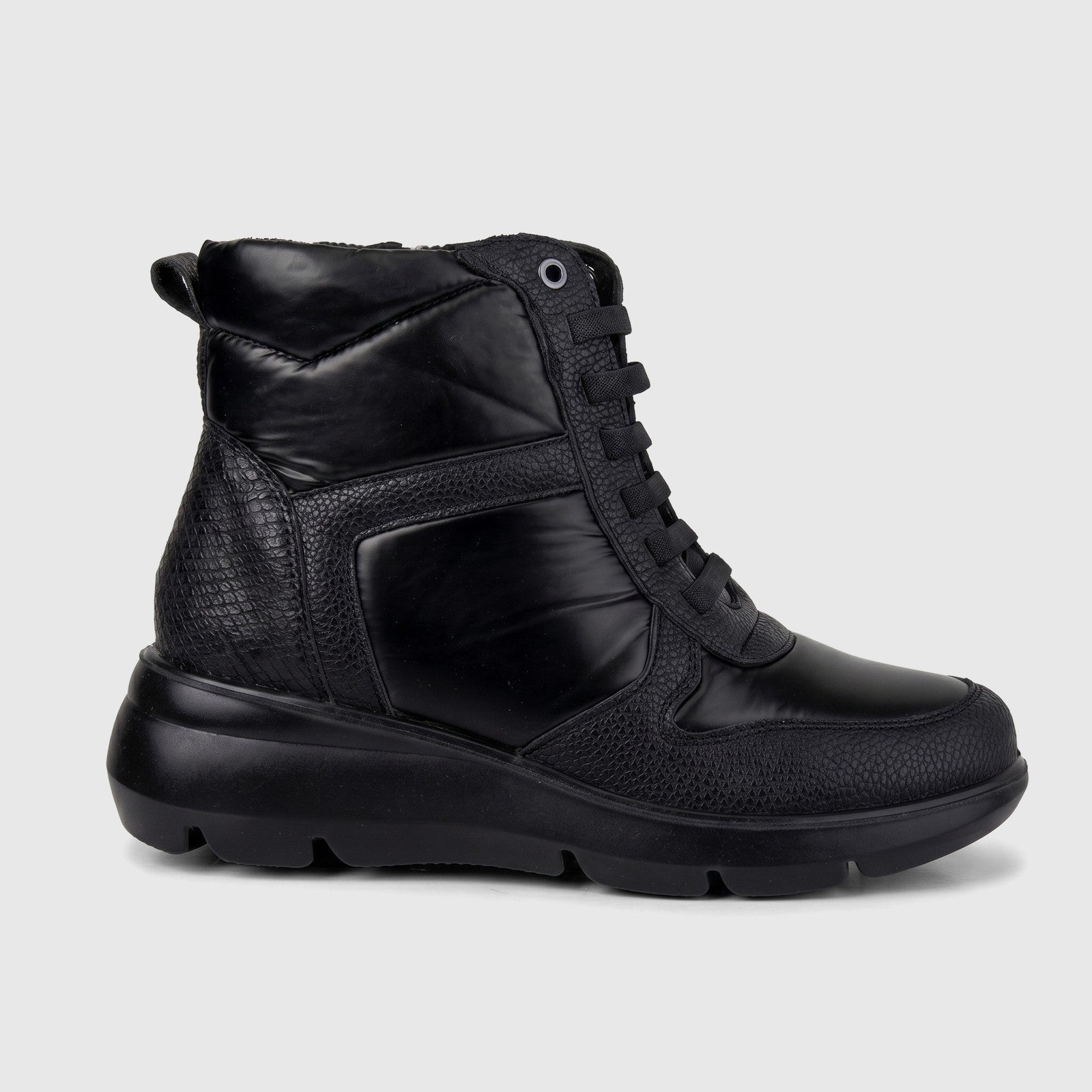 Hush Puppies Soft Style Ladies Lace Up Boot Johari SSL01604 in black, side view with textured panels and chunky sole