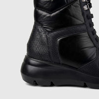 Hush Puppies Soft Style Johari SSL01604 ladies lace up boot in black, side view showing textured leather and chunky sole.