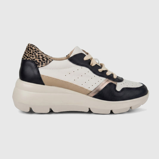 Hush Puppies Soft Style Jolanda ladies comfort sneaker in black multi with leopard heel panel and chunky sole, side view.