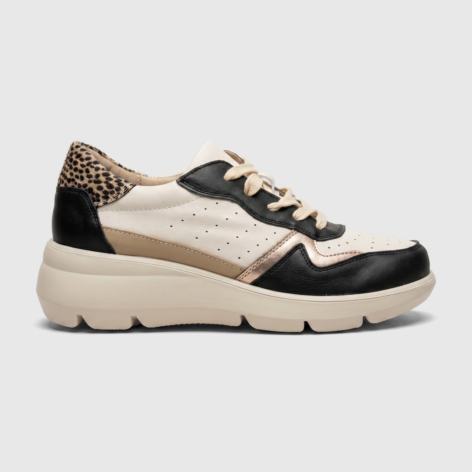 Hush Puppies Soft Style Jolanda ladies comfort sneaker in black multi, lace-up low top with chunky sole, side view.