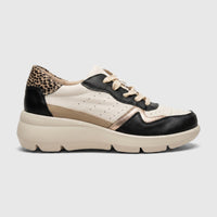 Hush Puppies Soft Style Jolanda ladies comfort sneaker in black multi, lace-up low top with chunky sole, side view.