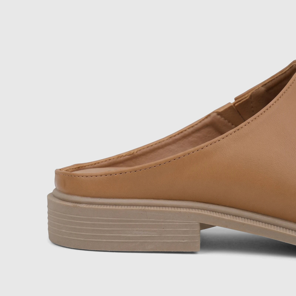 Caramel Hush Puppies Soft Style ladies comfort sandal, side view, showcasing its synthetic leather upper and low block heel.