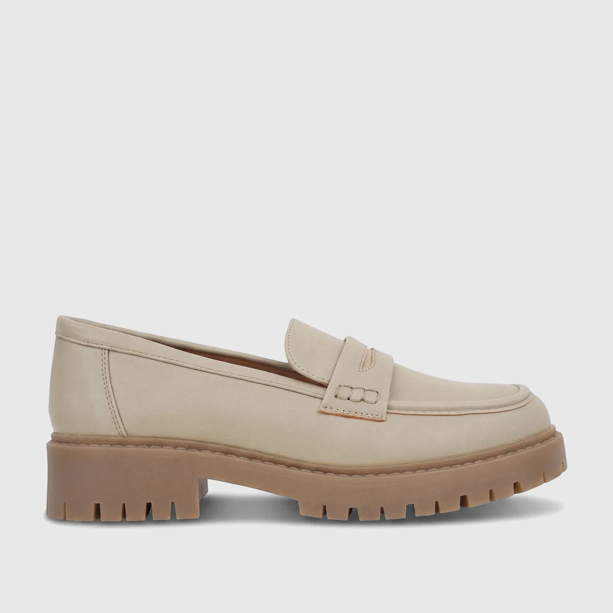 Hush Puppies Soft Style Lizbeth ladies loafer shoe in light sage with a chunky lug sole, shown in a side view.