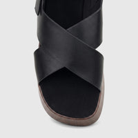 Black Hush Puppies Soft Style Posha comfort sandals for ladies, featuring a criss-cross strap design and a chunky platform