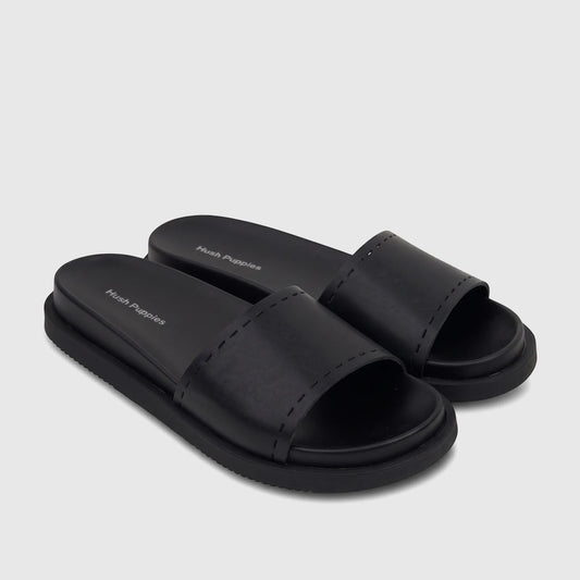 A single black HP Reya comfort slide sandal with a stitched strap, viewed from the side on a white background.