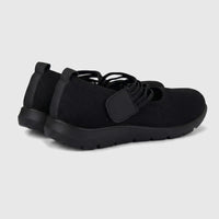 Hush Puppies Soft Style Soft Bartan ladies comfort pump in black with knit upper and thick cushioned sole, side view.