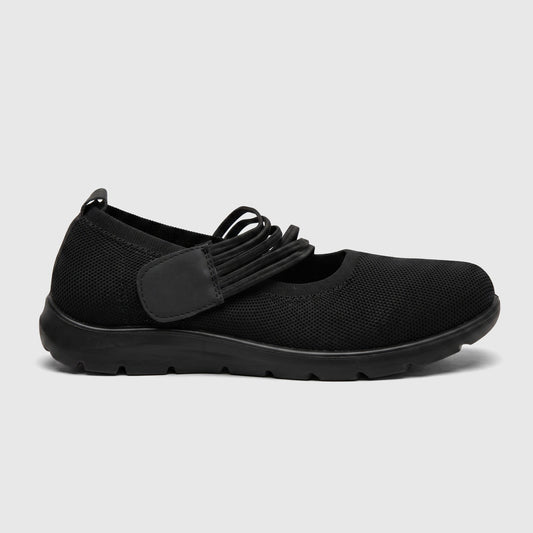 Hush Puppies Soft Style Soft Bartan ladies comfort pump in black, mesh slip-on shoe with elastic strap, side view.