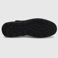 Hush Puppies Soft Style Soft Bartan ladies comfort pump in black, bottom view showing textured rubber outsole tread.