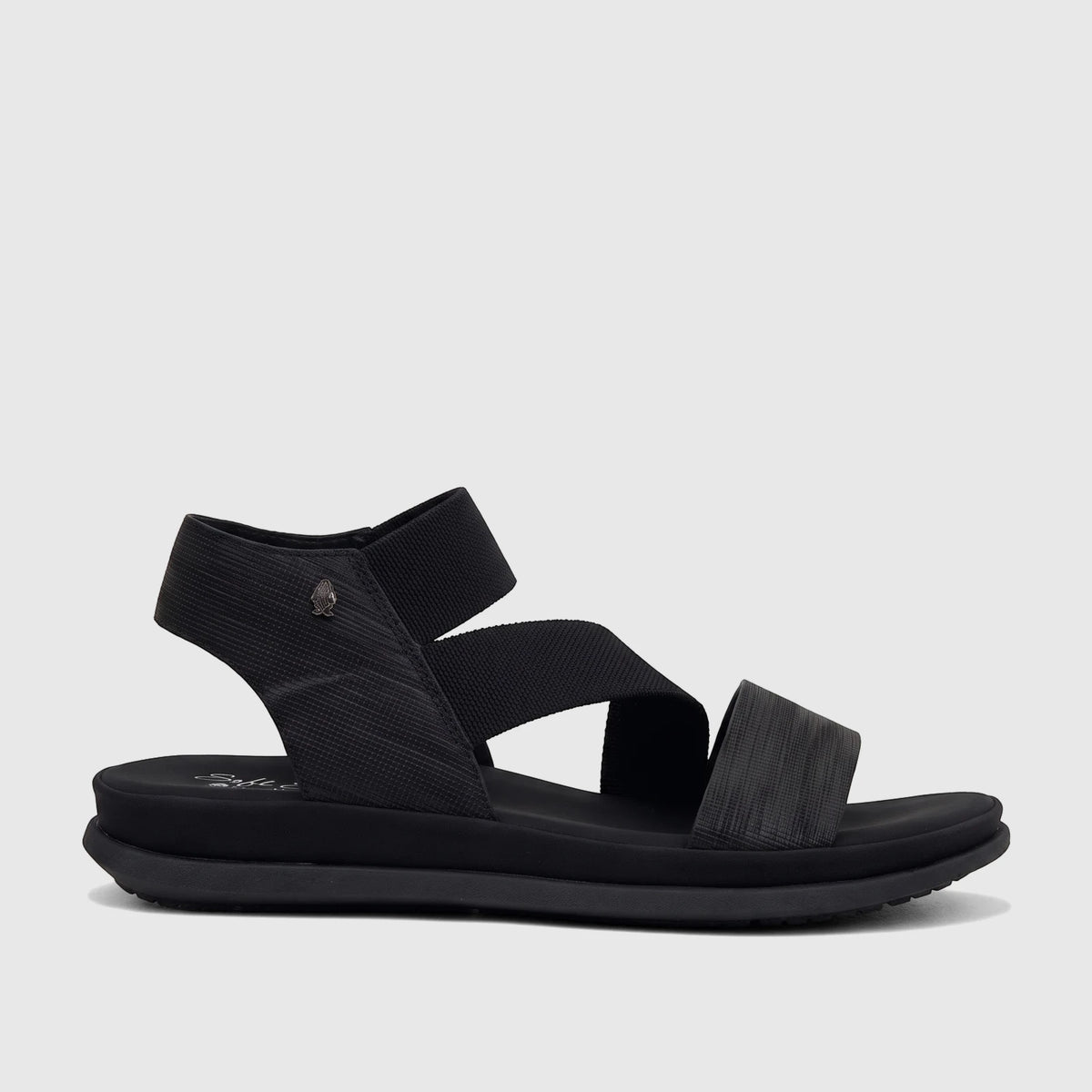 Black Hush Puppies Soft Style Indy comfort sandals for ladies, featuring elastic straps and a platform sole, side profile.