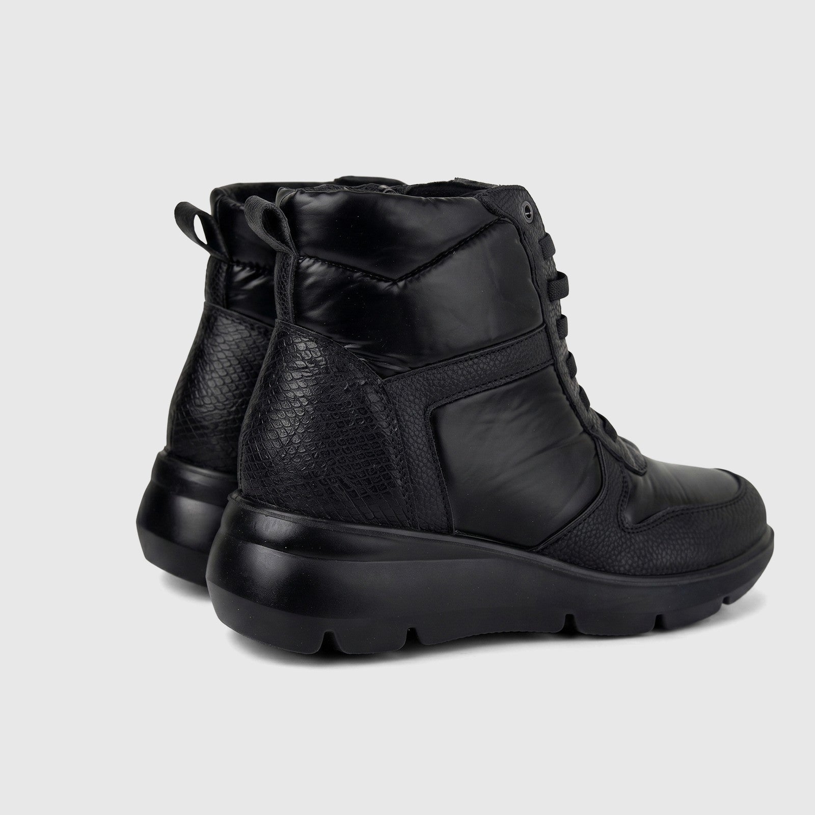 Hush Puppies Soft Style Johari ladies lace up boot in black, side view showing textured upper and chunky sole