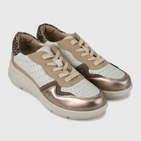 Hush Puppies Soft Style Jolanda ladies comfort sneaker with lace-up design, white and beige panels and metallic gold toe cap