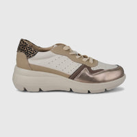 Hush Puppies Soft Style Jolanda ladies comfort sneaker, side view in cream and tan with metallic gold toe.