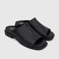 Pair of black Hush Puppies Soft Style Ladies Comfort Sandal Kathan SSL01677, open-toe slip-on style on a white background.