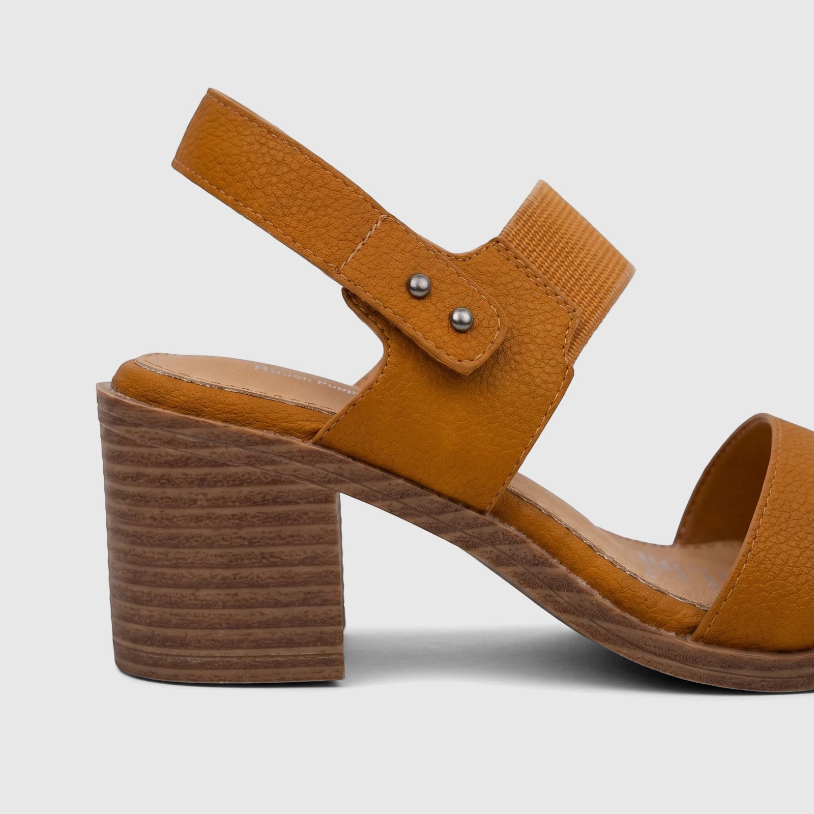 Burnt orange Hush Puppies Soft Style Ladies Block Heel Sandal, shown in a side view on a light background.