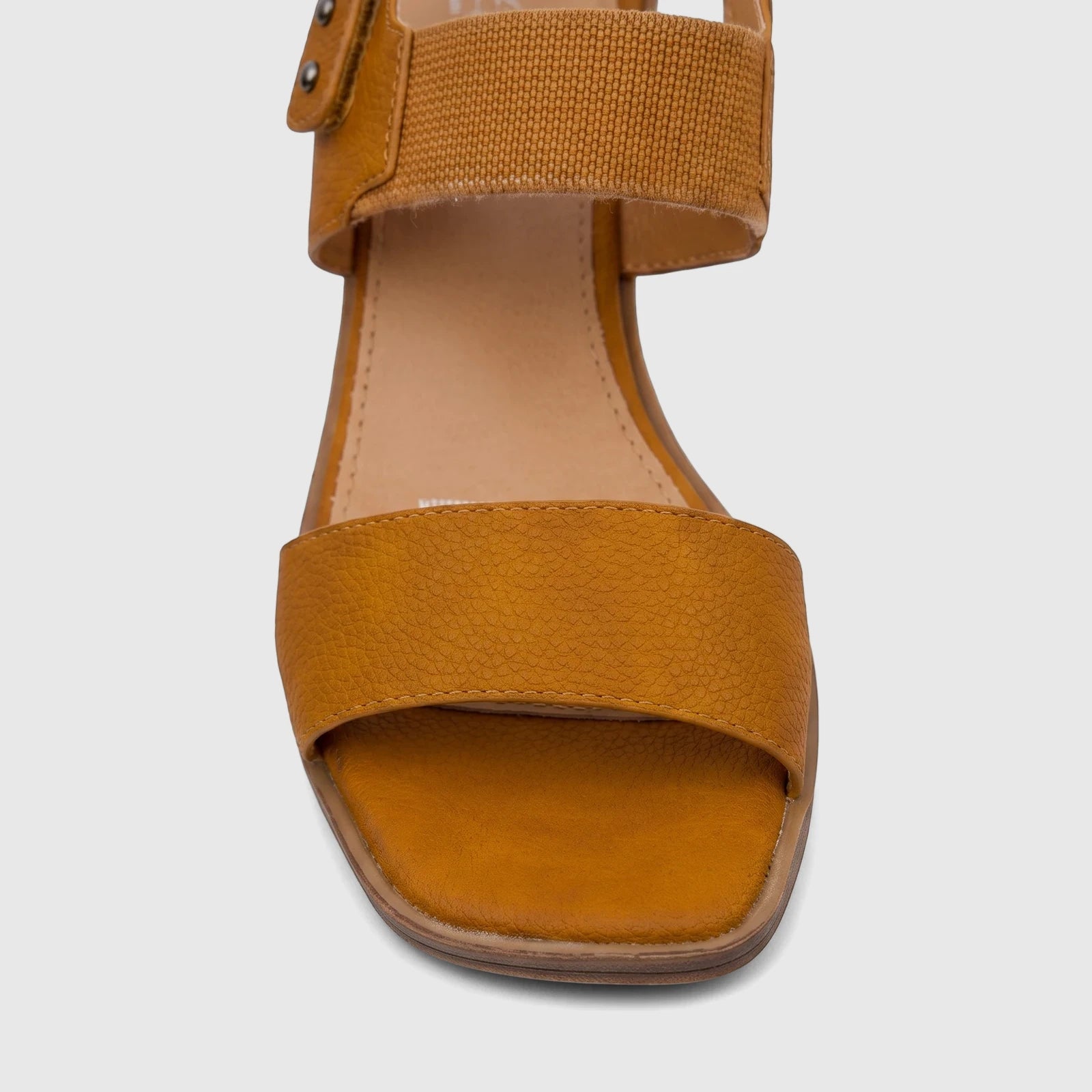 Front view of a Hush Puppies Soft Style Ladies Block Heel Sandal Abrianna in burnt orange textured leather.