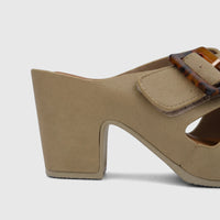A close-up shot of a fawn beige Hush Puppies Soft Style Ladies Block Heel Sandal, showcasing its textured upper and stylish