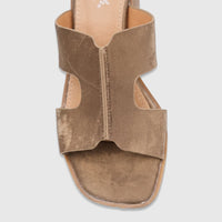 Close-up of a single Hush Puppies Soft Style ladies bronze block heel sandal, featuring wide straps and a square toe.
