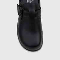 Close-up view of a black Hush Puppies Soft Style Ladies Comfort Clog, featuring textured faux leather and a buckle detail.