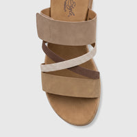 Hush Puppies Soft Style Ladies Comfort Sandal Carmen, featuring multi-tone beige, brown, and cream criss-cross straps,