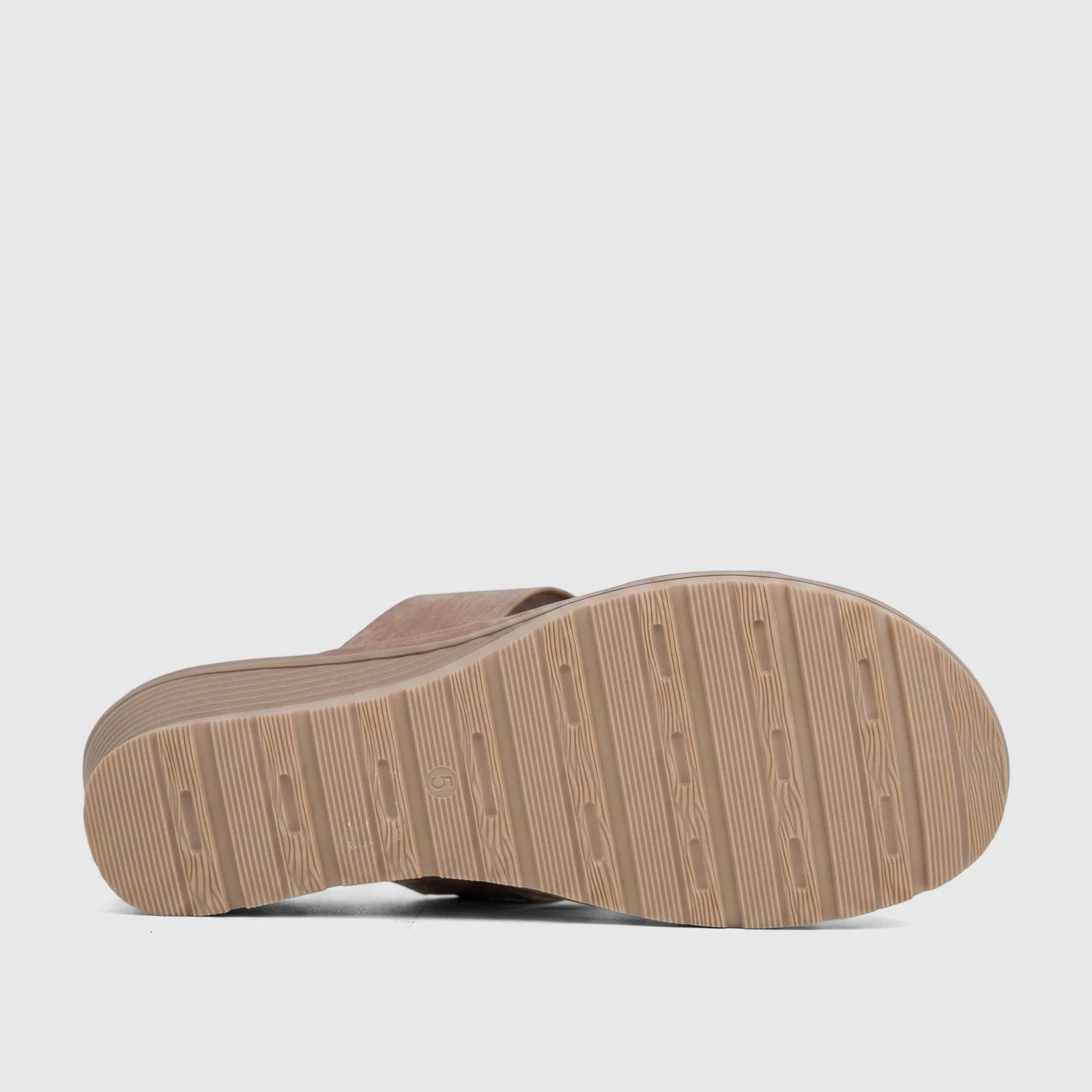 Bronze Hush Puppies Soft Style Ladies Comfort Wedge Sandal, shown from the underside to highlight the patterned sole.