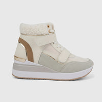 Hush Puppies Soft Style ladies ankle boot in natural cream and grey, featuring a fur collar, velcro straps, and a wedge sole.