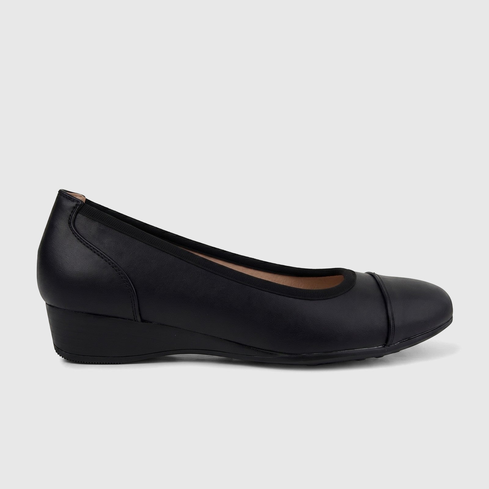 Black Hush Puppies Soft Style Rishelle Mono comfort wedge pump for ladies, shown in a side profile view.