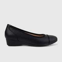 Black Hush Puppies Soft Style Rishelle Mono comfort wedge pump for ladies, shown in a side profile view.