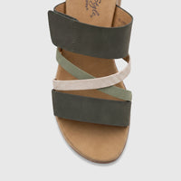 Top-down view of a Hush Puppies Soft Style Ladies Comfort Sandal Carmen with khaki multi-colored straps and a cork-textured