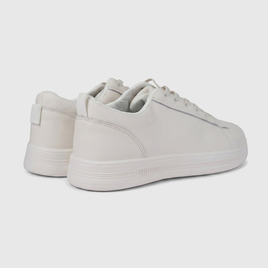 Hush Puppies Soft Style Tavaria ivory ladies comfort sneaker with lace-up closure, side profile view