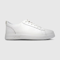 Hush Puppies Soft Style Tavaria ivory ladies comfort sneaker with lace-up closure, side profile view
