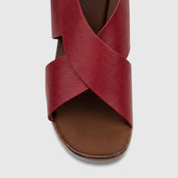 Close-up of a Hush Puppies Soft Style Ladies Block Heel Sandal Tharin in burnished dark red, featuring criss-cross textured