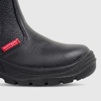 Close-up of a black Hush Puppies Unisex Safety Boot with a steel toe and textured workwear upper, showing the red brand