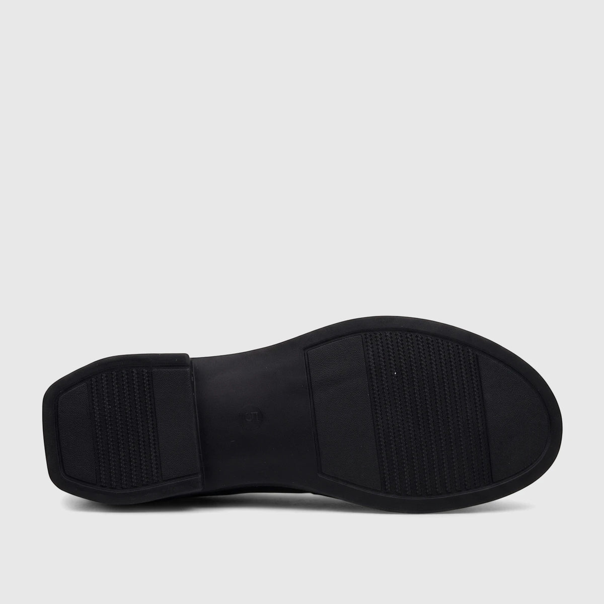 Hush Puppies black Valonia comfort pump, showing the textured anti-slip sole with size 41 marking.
