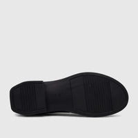 Hush Puppies black Valonia comfort pump, showing the textured anti-slip sole with size 41 marking.