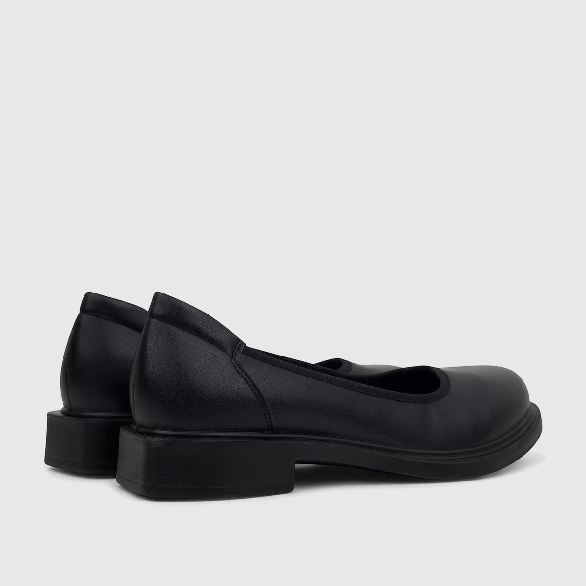 Pair of black Hush Puppies Valonia ladies comfort pumps, showcasing the soft style and low block heel.