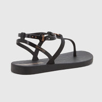 Black Ipanema Atena thong sandals with ankle straps and gold-tone buckle details, shown from a slight elevated angle.