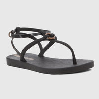 Black Ipanema Atena flat thong sandals for women, with an ankle strap and elegant beige hardware details.