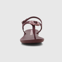 Ipanema Class Dreamy Sandal in burgundy with a decorative buckle, thong strap, and adjustable ankle strap, front view.