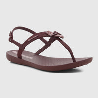 Burgundy Ipanema Class Dreamy women's sandal with a textured sole and metallic rose gold-tone oval buckle, viewed from the