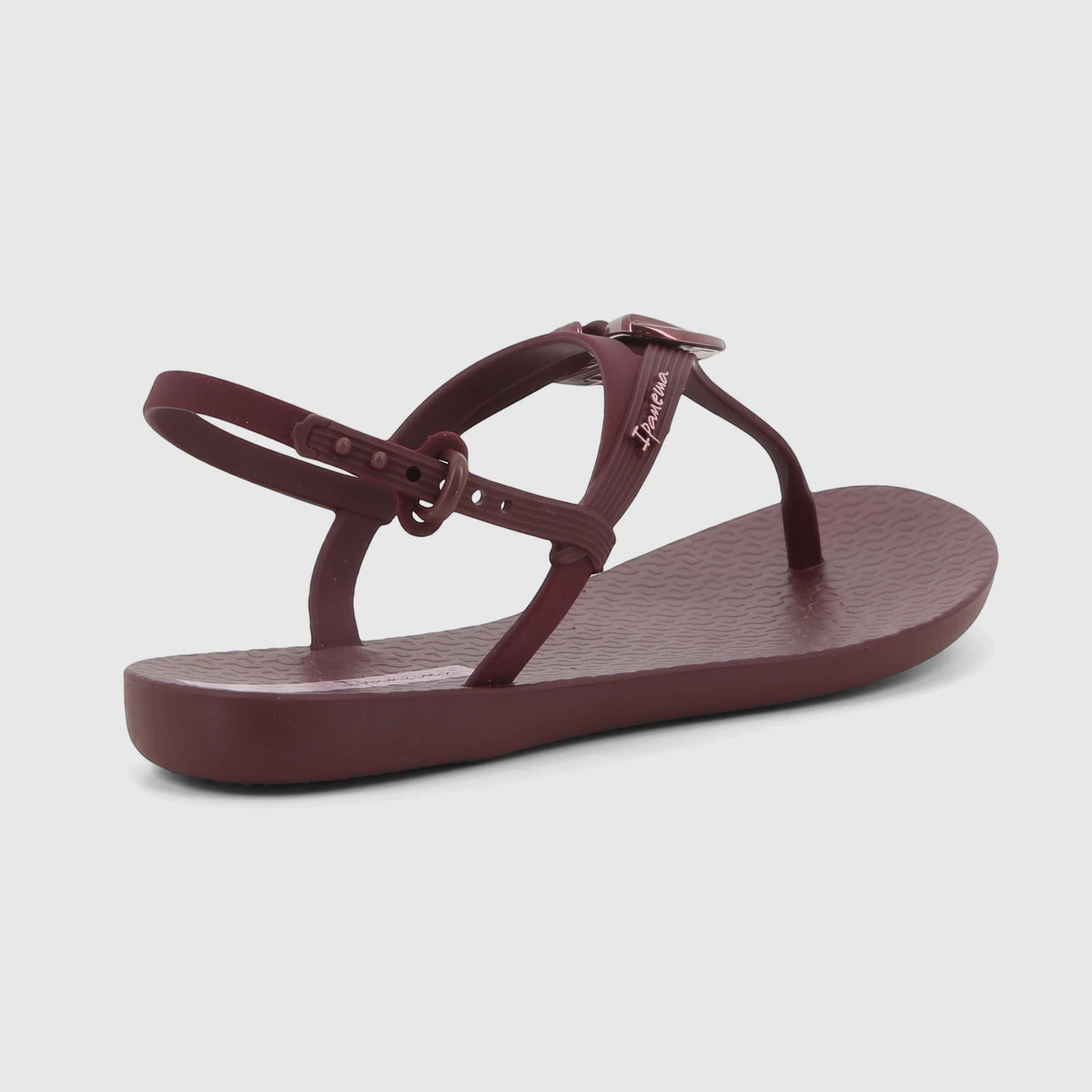 Burgundy Ipanema Class Dreamy T-strap sandal with ankle buckle, displayed at an angle, showing the brand logo on the strap.