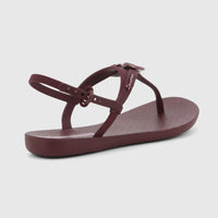 Burgundy Ipanema Class Dreamy T-strap sandal with ankle buckle, displayed at an angle, showing the brand logo on the strap.