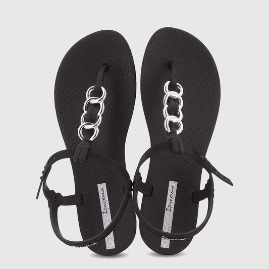 Black Ipanema Class Lizz women's sandal with silver chain embellishment on a thong strap, shown in a side view.