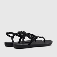 Pair of Ipanema Class Lizz sandals in black with silver chain embellishments on the T-strap, presented in a side view.