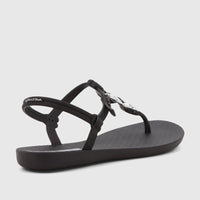 Black Ipanema Class Lizz women's T-strap sandal with a flat sole and silver leaf-like ornamentation, shown from a rear-side