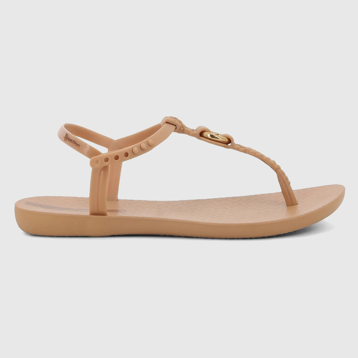 Ipanema Class Luma GIL27428 women's beige brown T-strap sandal with gold metallic detail on a rubber sole.