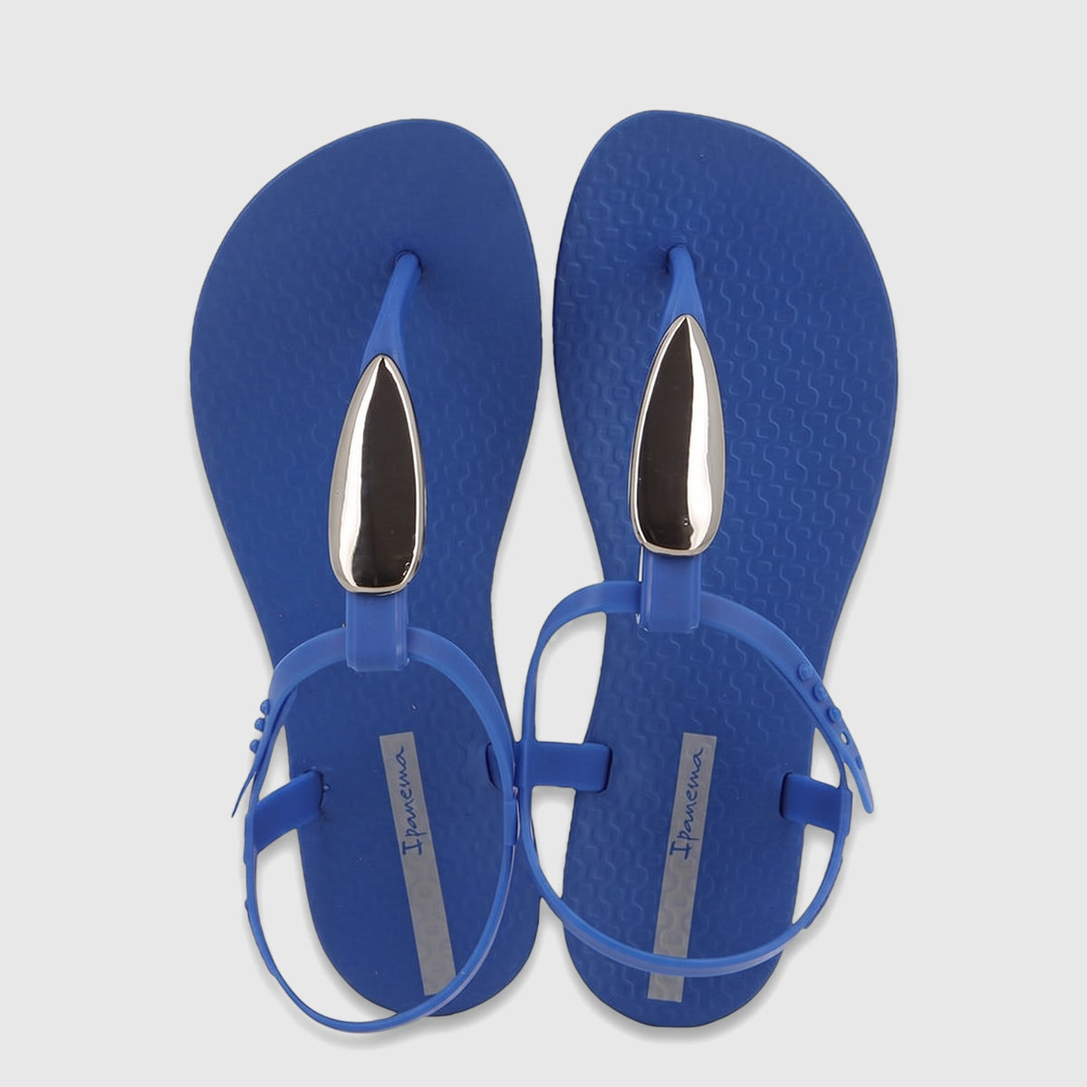 Pair of Ipanema Class Luxury GIL83954 sandals in blue with silver metallic accents, shown upright.