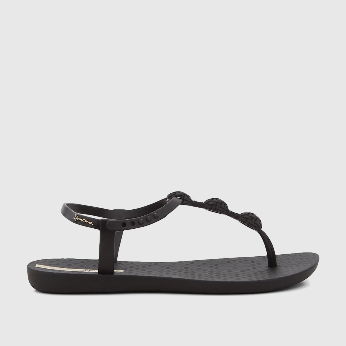 A black Ipanema Class Posh sandal, featuring a thong-style strap with braided-look details and an adjustable ankle strap.