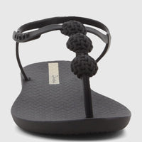Black Ipanema Class Posh Sandal with braided thong strap, low angle front view, featuring a textured sole.